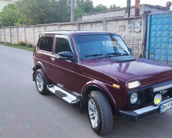 Красный ВАЗ 21213 Niva, объемом двигателя 1.7 л и пробегом 130 тыс. км за 5200 $, фото 1 на Automoto.ua