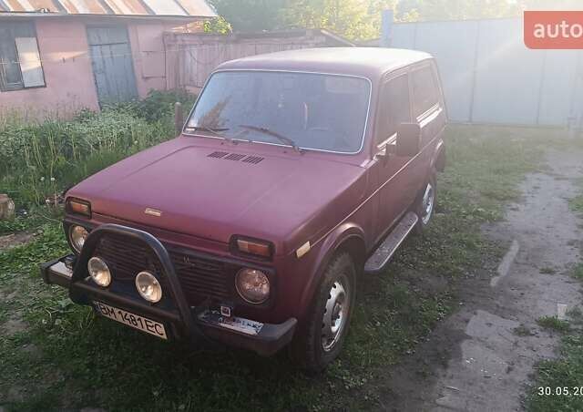 Красный ВАЗ 21213 Niva, объемом двигателя 1.7 л и пробегом 185 тыс. км за 1500 $, фото 1 на Automoto.ua