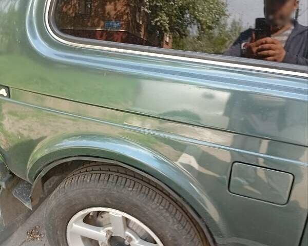 Зеленый ВАЗ 21214, объемом двигателя 1.7 л и пробегом 100 тыс. км за 4500 $, фото 1 на Automoto.ua