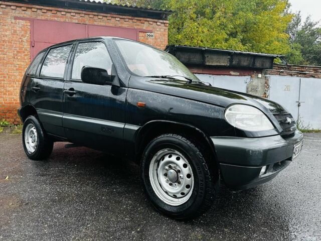 Черный ВАЗ 2123 Niva, объемом двигателя 1.7 л и пробегом 176 тыс. км за 3700 $, фото 1 на Automoto.ua