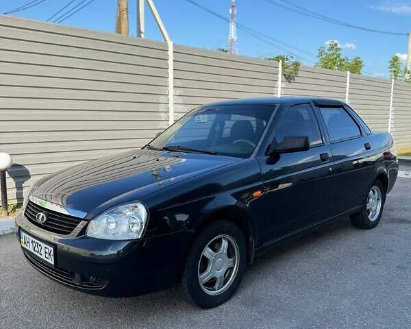 Черный ВАЗ 2170 Priora, объемом двигателя 1.6 л и пробегом 165 тыс. км за 2050 $, фото 1 на Automoto.ua