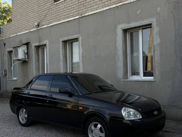 Черный ВАЗ 2170 Priora, объемом двигателя 1.6 л и пробегом 250 тыс. км за 2557 $, фото 1 на Automoto.ua