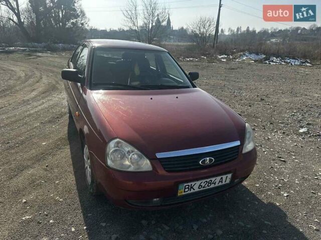 Красный ВАЗ 2170 Priora, объемом двигателя 1.6 л и пробегом 186 тыс. км за 2600 $, фото 1 на Automoto.ua