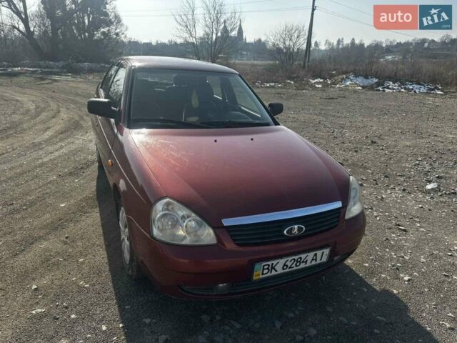 Красный ВАЗ 2170 Priora, объемом двигателя 1.6 л и пробегом 186 тыс. км за 2600 $, фото 1 на Automoto.ua