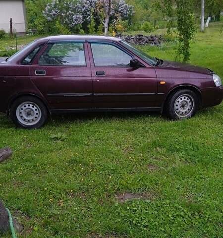 Красный ВАЗ 2170 Priora, объемом двигателя 1.6 л и пробегом 238 тыс. км за 1650 $, фото 1 на Automoto.ua