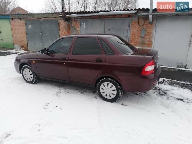 Красный ВАЗ 2170 Priora, объемом двигателя 1.6 л и пробегом 320 тыс. км за 2500 $, фото 1 на Automoto.ua