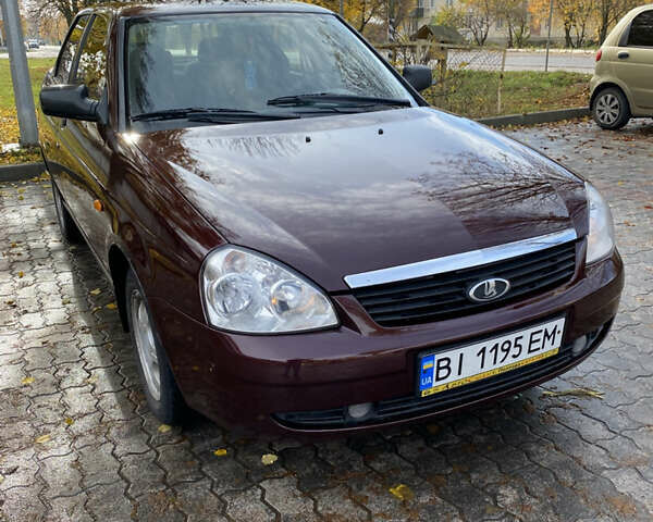 Красный ВАЗ 2170 Priora, объемом двигателя 1.6 л и пробегом 200 тыс. км за 2300 $, фото 1 на Automoto.ua