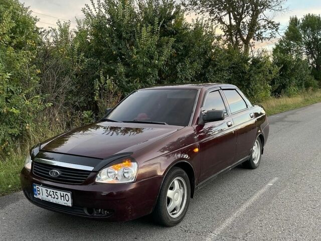 Красный ВАЗ 2170 Priora, объемом двигателя 1.6 л и пробегом 221 тыс. км за 2599 $, фото 1 на Automoto.ua