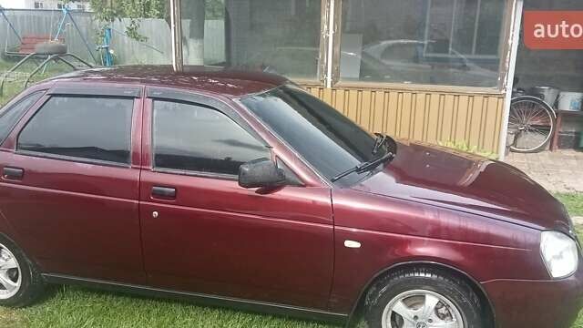 Красный ВАЗ 2170 Priora, объемом двигателя 1.6 л и пробегом 160 тыс. км за 2100 $, фото 1 на Automoto.ua