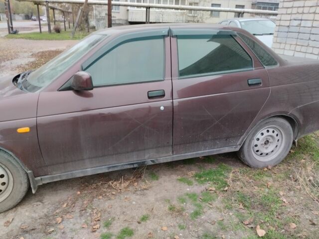 Красный ВАЗ 2170 Priora, объемом двигателя 1.6 л и пробегом 172 тыс. км за 1549 $, фото 1 на Automoto.ua