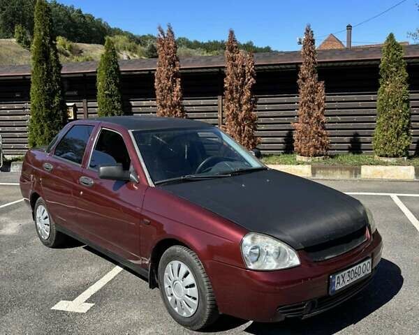 Красный ВАЗ 2170 Priora, объемом двигателя 1.6 л и пробегом 146 тыс. км за 1850 $, фото 1 на Automoto.ua