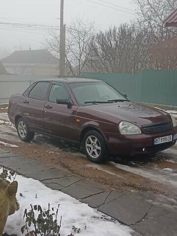 Красный ВАЗ 2170 Priora, объемом двигателя 1.6 л и пробегом 161 тыс. км за 2100 $, фото 1 на Automoto.ua