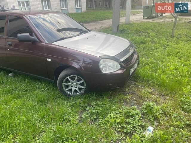 Красный ВАЗ 2170 Priora, объемом двигателя 1.6 л и пробегом 185 тыс. км за 2650 $, фото 1 на Automoto.ua