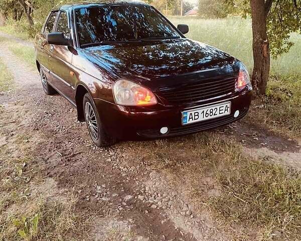 Красный ВАЗ 2170 Priora, объемом двигателя 1.6 л и пробегом 221 тыс. км за 2500 $, фото 1 на Automoto.ua