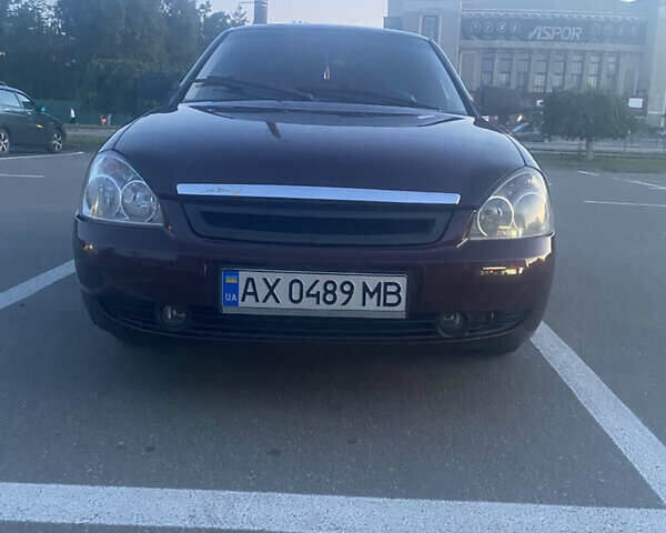 Красный ВАЗ 2170 Priora, объемом двигателя 1.6 л и пробегом 310 тыс. км за 2450 $, фото 1 на Automoto.ua
