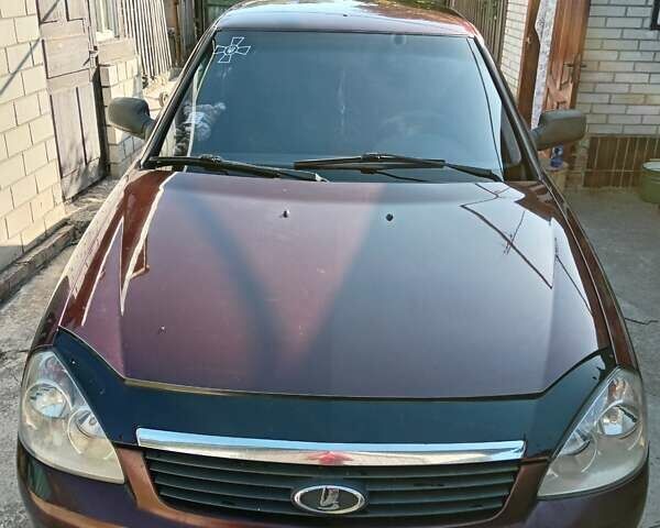 Красный ВАЗ 2170 Priora, объемом двигателя 1.6 л и пробегом 225 тыс. км за 3150 $, фото 1 на Automoto.ua