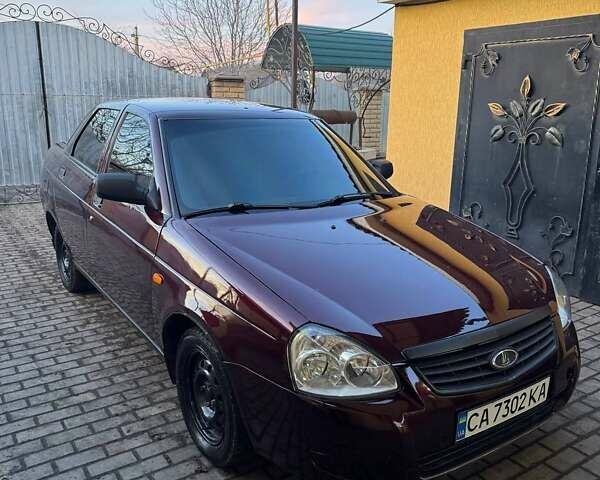 Красный ВАЗ 2170 Priora, объемом двигателя 1.6 л и пробегом 110 тыс. км за 2600 $, фото 1 на Automoto.ua