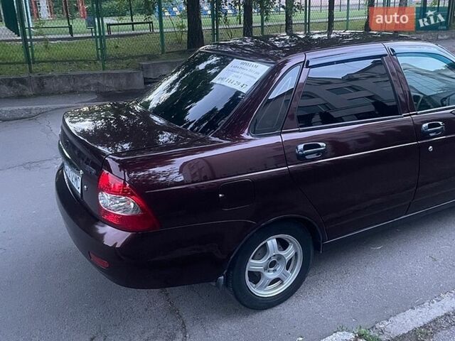 Красный ВАЗ 2170 Priora, объемом двигателя 1.6 л и пробегом 145 тыс. км за 2350 $, фото 1 на Automoto.ua