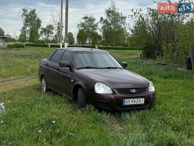 Красный ВАЗ 2170 Priora, объемом двигателя 1.6 л и пробегом 310 тыс. км за 2300 $, фото 1 на Automoto.ua