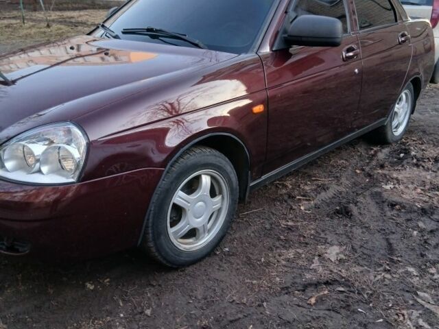 Красный ВАЗ 2170 Priora, объемом двигателя 1 л и пробегом 128 тыс. км за 3850 $, фото 1 на Automoto.ua