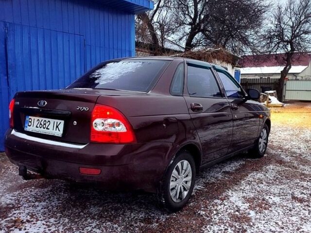 Красный ВАЗ 2170 Priora, объемом двигателя 1.6 л и пробегом 176 тыс. км за 2400 $, фото 1 на Automoto.ua