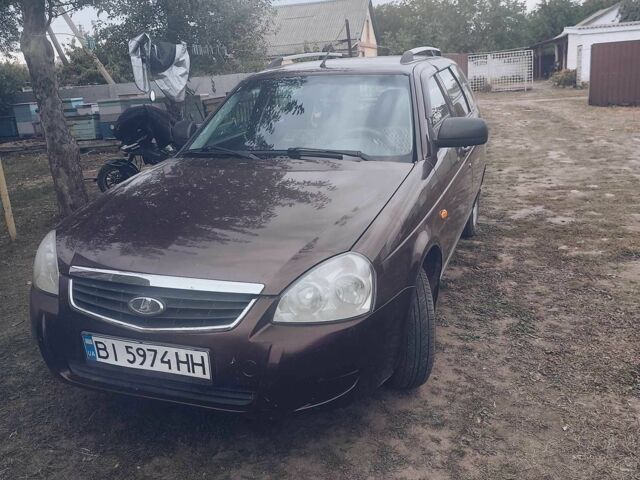 Красный ВАЗ 2171 Priora, объемом двигателя 1.6 л и пробегом 166 тыс. км за 4000 $, фото 1 на Automoto.ua