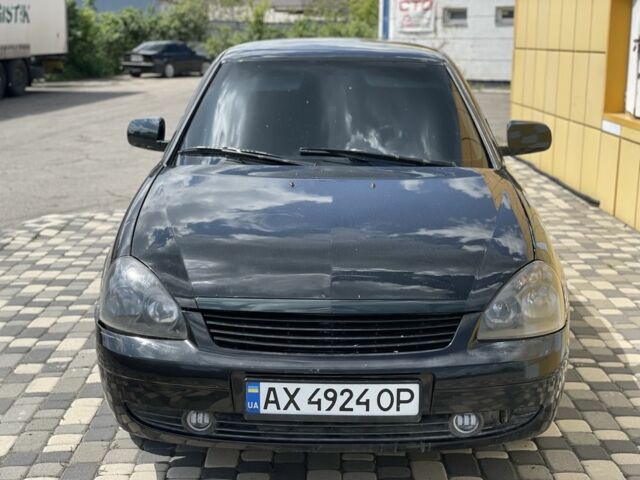 Черный ВАЗ 2172 Priora, объемом двигателя 1.6 л и пробегом 150 тыс. км за 3000 $, фото 1 на Automoto.ua