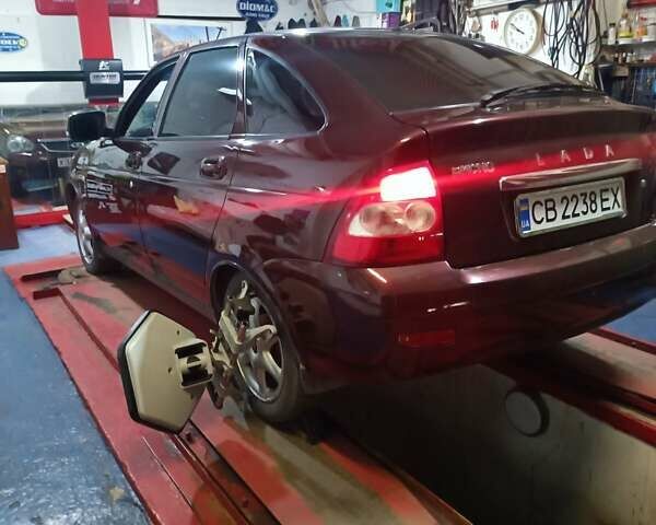 Красный ВАЗ 2172 Priora, объемом двигателя 1.6 л и пробегом 210 тыс. км за 2350 $, фото 1 на Automoto.ua