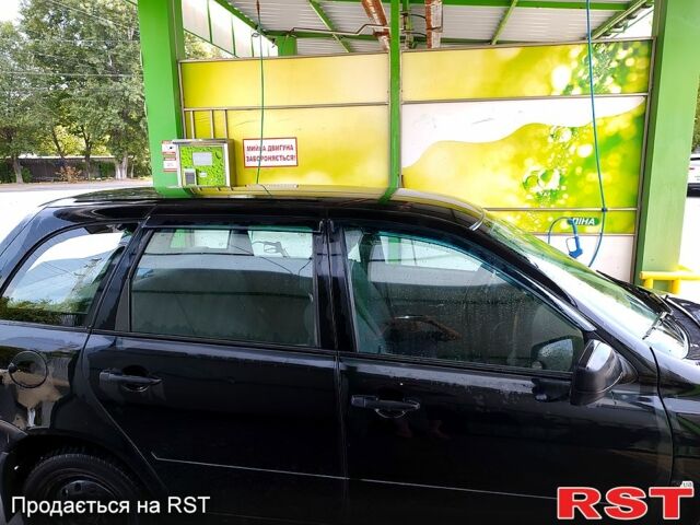 Черный ВАЗ Kalina, объемом двигателя 1.4 л и пробегом 200 тыс. км за 1800 $, фото 1 на Automoto.ua