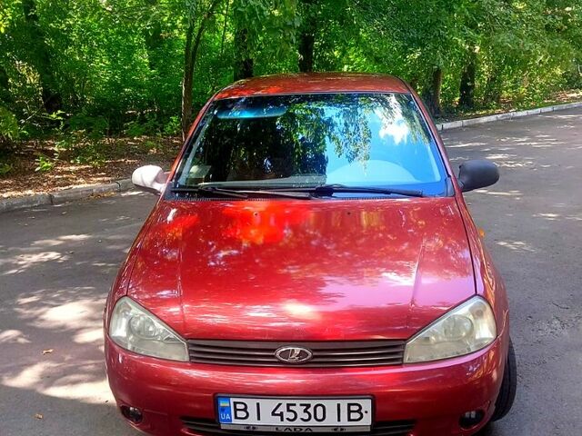 Красный ВАЗ Kalina, объемом двигателя 1.6 л и пробегом 251 тыс. км за 2400 $, фото 1 на Automoto.ua