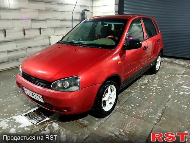 Красный ВАЗ Kalina, объемом двигателя 1.6 л и пробегом 300 тыс. км за 1200 $, фото 1 на Automoto.ua