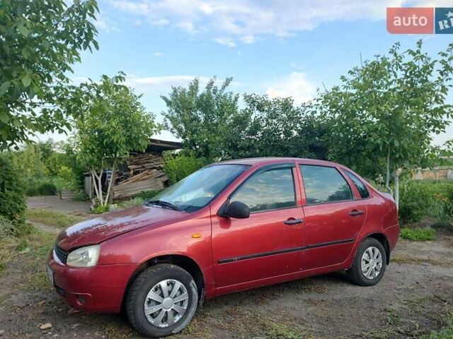 Красный ВАЗ Калина, объемом двигателя 1.6 л и пробегом 280 тыс. км за 1863 $, фото 1 на Automoto.ua