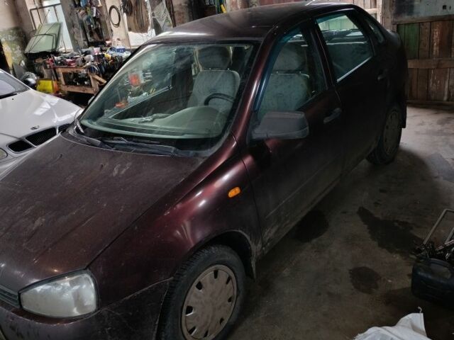 Красный ВАЗ Калина, объемом двигателя 1.4 л и пробегом 185 тыс. км за 2850 $, фото 1 на Automoto.ua