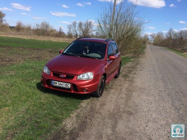 Красный ВАЗ Lada Kalina, объемом двигателя 1.4 л и пробегом 164 тыс. км за 3999 $, фото 1 на Automoto.ua