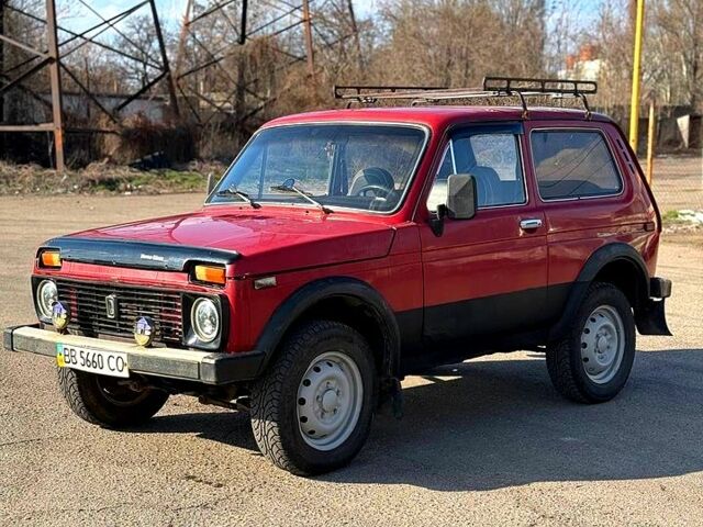 Червоний ВАЗ Нива, об'ємом двигуна 1.7 л та пробігом 150 тис. км за 1200 $, фото 1 на Automoto.ua