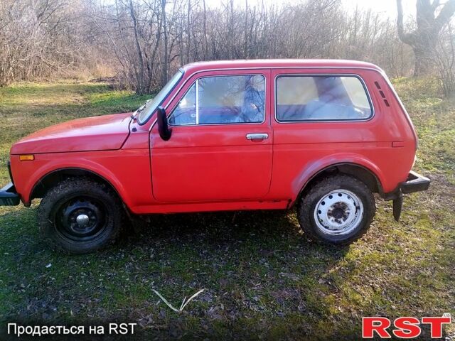 Червоний ВАЗ Нива, об'ємом двигуна 1.6 л та пробігом 150 тис. км за 1500 $, фото 1 на Automoto.ua