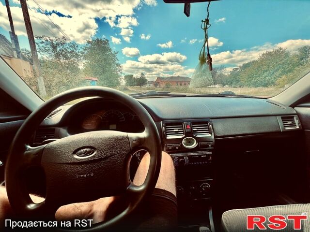 Черный ВАЗ Priora, объемом двигателя 1.6 л и пробегом 159 тыс. км за 2900 $, фото 1 на Automoto.ua