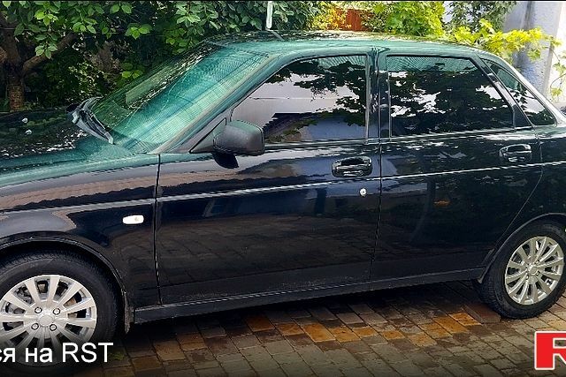 Черный ВАЗ Priora, объемом двигателя 1.6 л и пробегом 230 тыс. км за 1600 $, фото 1 на Automoto.ua