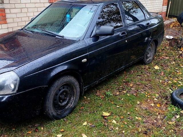 Черный ВАЗ Priora, объемом двигателя 1.6 л и пробегом 330 тыс. км за 2400 $, фото 1 на Automoto.ua