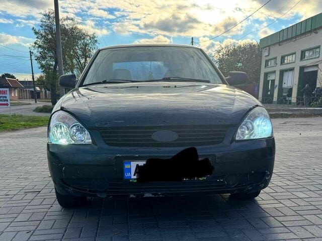 Черный ВАЗ Priora, объемом двигателя 1.6 л и пробегом 253 тыс. км за 1999 $, фото 1 на Automoto.ua