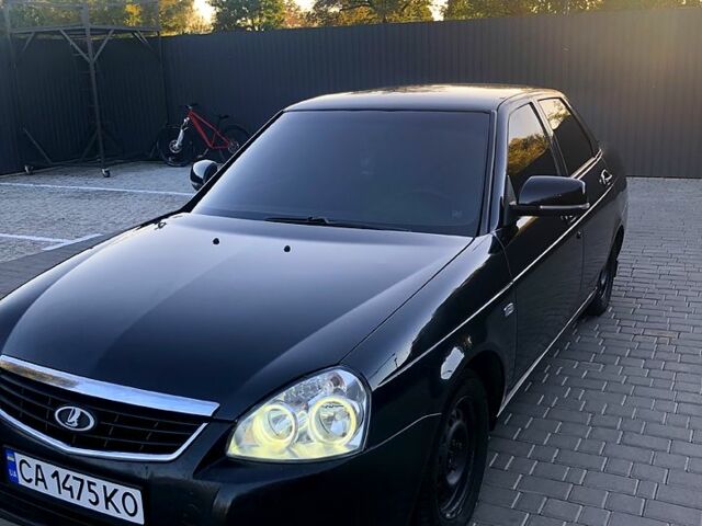 Черный ВАЗ Priora, объемом двигателя 1.6 л и пробегом 350 тыс. км за 2600 $, фото 1 на Automoto.ua