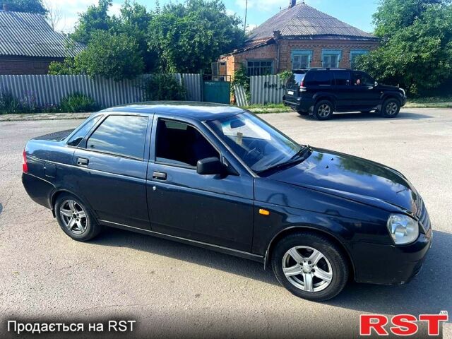 Черный ВАЗ Priora, объемом двигателя 1.6 л и пробегом 555 тыс. км за 1650 $, фото 1 на Automoto.ua