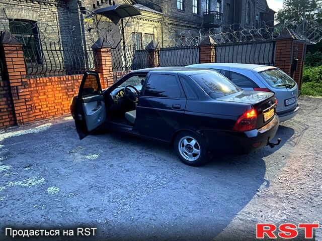 Черный ВАЗ Priora, объемом двигателя 1.6 л и пробегом 180 тыс. км за 1999 $, фото 1 на Automoto.ua