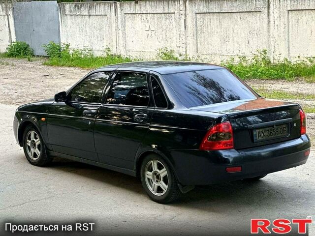 Черный ВАЗ Priora, объемом двигателя 1.6 л и пробегом 200 тыс. км за 1999 $, фото 1 на Automoto.ua