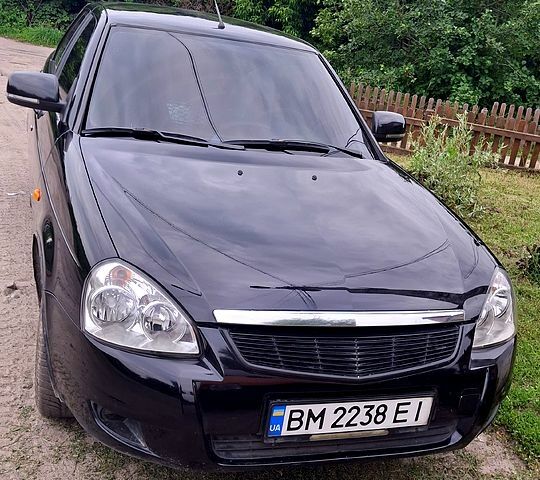 Черный ВАЗ Priora, объемом двигателя 1.6 л и пробегом 303 тыс. км за 3900 $, фото 1 на Automoto.ua