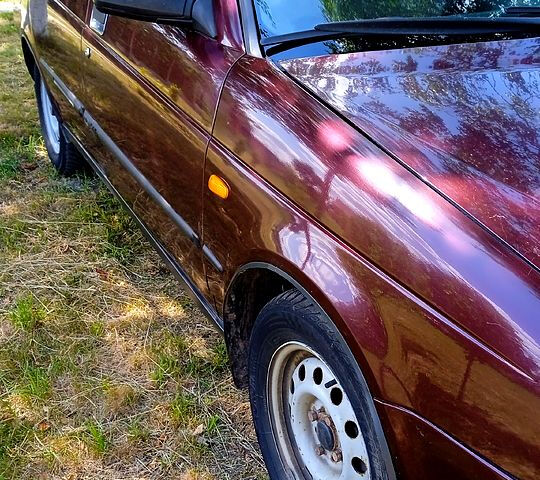 Красный ВАЗ Priora, объемом двигателя 1.6 л и пробегом 238 тыс. км за 1550 $, фото 1 на Automoto.ua