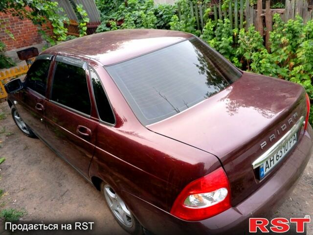 Червоний ВАЗ Priora, об'ємом двигуна 1.6 л та пробігом 142 тис. км за 3010 $, фото 1 на Automoto.ua