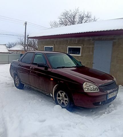 Червоний ВАЗ Priora, об'ємом двигуна 1.6 л та пробігом 161 тис. км за 2100 $, фото 1 на Automoto.ua