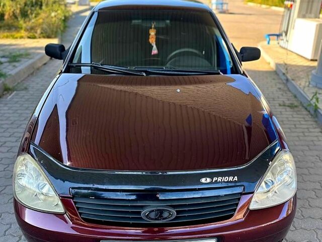 Красный ВАЗ Priora, объемом двигателя 1.6 л и пробегом 227 тыс. км за 1750 $, фото 1 на Automoto.ua