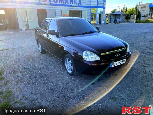 Красный ВАЗ Priora, объемом двигателя 1.6 л и пробегом 115 тыс. км за 3500 $, фото 1 на Automoto.ua